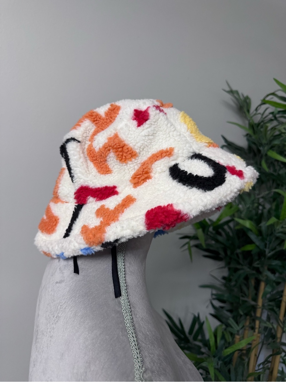 Cozy Multicolor Sherpa Bucket Hat - White with Orange & Red Accents